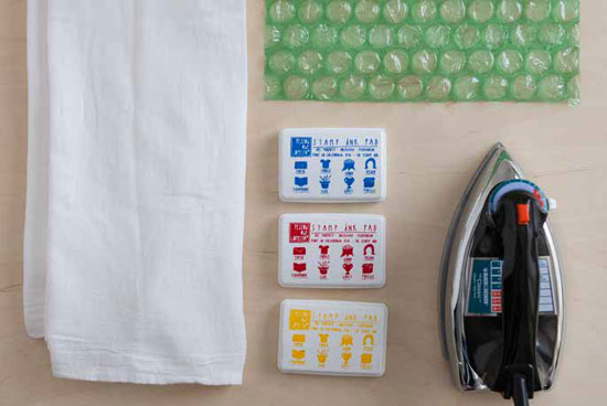 The materials needed to create patterns on tea towels are basic and readily available in many homes.